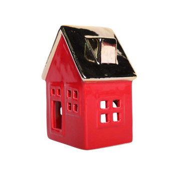 Czerwony domek ceramiczny ze złotym dachem z miejscem na tilajty